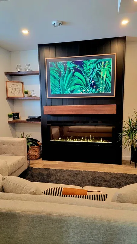 photo of a fireplace the Fieldhouse basement, designed and built by KMA Building in Winnipeg, MB