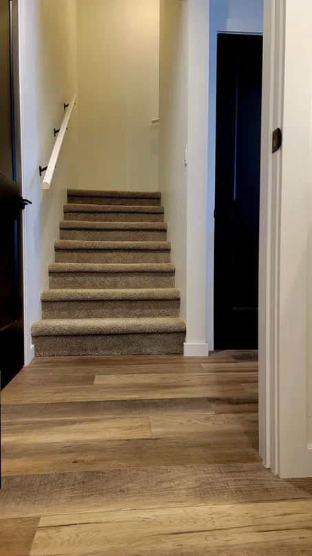 photo of the stairs in the Fieldhouse basement, designed and built by KMA Building in Winnipeg, MB