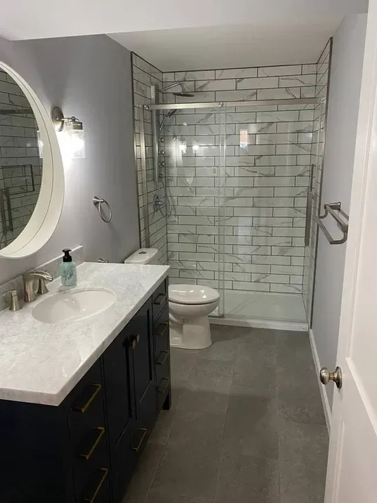 photo of the bathroom in the Goldeneye basement, designed and built by KMA Building in Winnipeg, MB