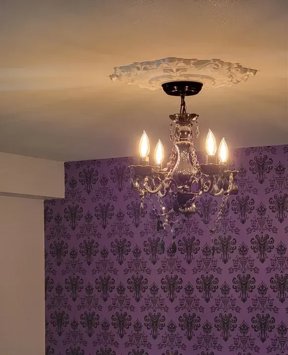 photo of a chandelier in the Marshal basement, designed and built by KMA Building in Winnipeg, MB