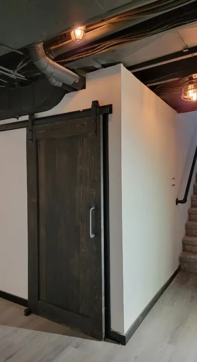 photo of a door in the Marshal basement, designed and built by KMA Building in Winnipeg, MB