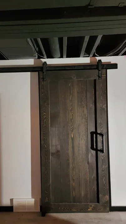 photo of a door in the Marshal basement, designed and built by KMA Building in Winnipeg, MB